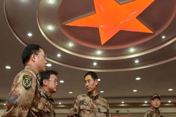 China Says Army Is Not Behind Attacks