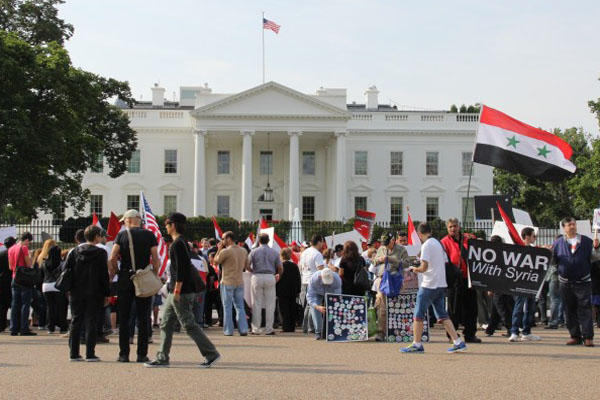 Washington demonstrators mark anniversary of Syrian chemical weapons attack